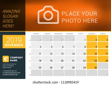 November 2019. Desk Calendar for 2019 Year. Vector Design Print Template with Place for Photo, Logo and Contact Information. Week Starts on Monday. Calendar Grid with Week Numbers and Place for Notes