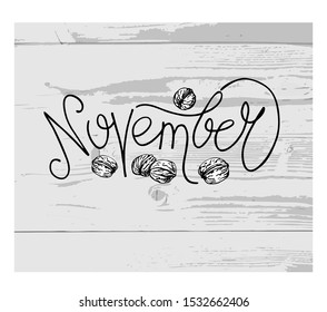 November vector lettering with walnuts.