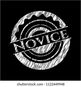 Novice chalk emblem written on a blackboard