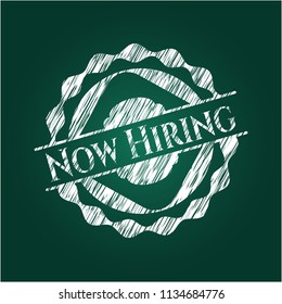 Now Hiring chalkboard emblem on black board