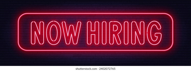 Now Hiring neon sign on brick wall background