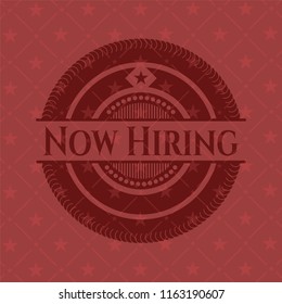 Now Hiring red emblem