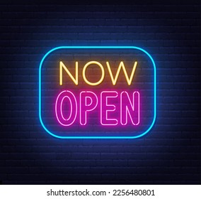 Now Open neon sign in frame on brick wall background.