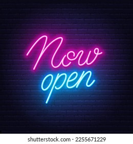 Now Open neon sign on brick wall background.