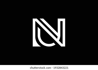 NU letter logo design on luxury background. UN monogram initials letter logo concept. NU icon design. UN elegant and Professional white color letter icon design on black background.