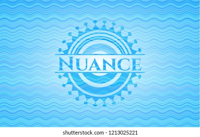 Nuance light blue water badge.