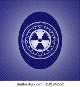 nuclear, radioactive icon inside badge with jean texture
