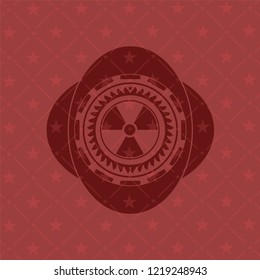 nuclear, radioactive icon inside badge with red background