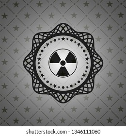 nuclear, radioactive icon inside black badge