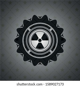 nuclear, radioactive icon inside black emblem