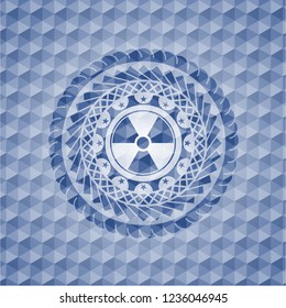 nuclear, radioactive icon inside blue polygonal badge.