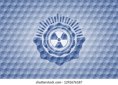 nuclear, radioactive icon inside blue hexagon badge.