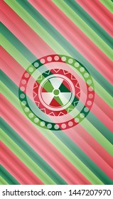 nuclear, radioactive icon inside christmas colors badge.