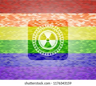 nuclear, radioactive icon inside emblem on mosaic background with the colors of the LGBT flag