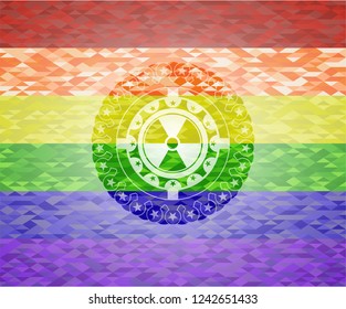 nuclear, radioactive icon inside emblem on mosaic background with the colors of the LGBT flag
