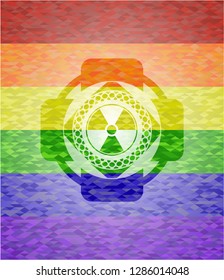 nuclear, radioactive icon inside emblem on mosaic background with the colors of the LGBT flag
