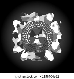 nuclear, radioactive icon inside grey camo texture