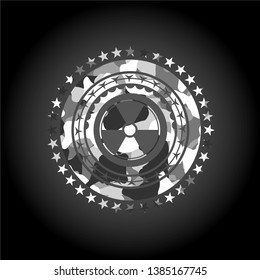 nuclear, radioactive icon inside grey camouflage texture