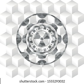 nuclear, radioactive icon inside grey badge with geometric cube white background