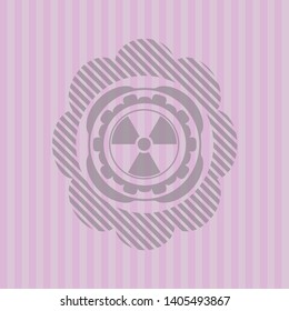 nuclear, radioactive icon inside pink emblem