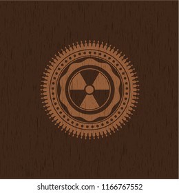nuclear, radioactive icon inside realistic wood emblem