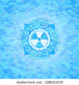 nuclear, radioactive icon inside realistic light blue emblem. Mosaic background