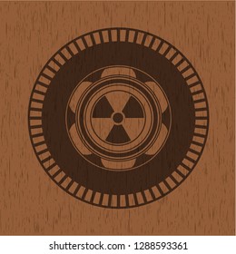 nuclear, radioactive icon inside realistic wood emblem