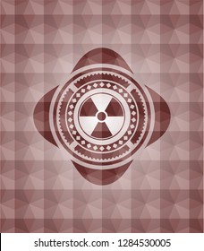 nuclear, radioactive icon inside red seamless badge with geometric background.