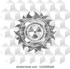 nuclear, radioactive icon inside retro style grey emblem with geometric cube white background