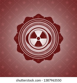 nuclear, radioactive icon inside retro red emblem