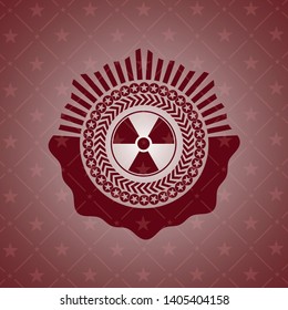 nuclear, radioactive icon inside retro red emblem