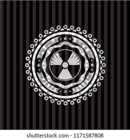 nuclear, radioactive icon inside silver badge or emblem