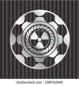 nuclear, radioactive icon inside silver emblem or badge