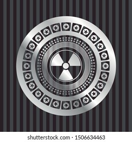 nuclear, radioactive icon inside silvery badge or emblem