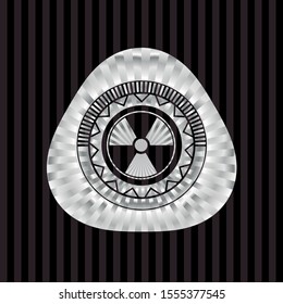 nuclear, radioactive icon inside silvery emblem or badge