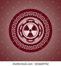 nuclear, radioactive icon inside vintage red emblem