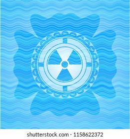 nuclear, radioactive icon inside water wave concept badge background.