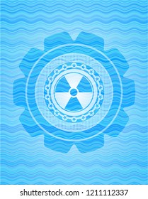 nuclear, radioactive icon inside water concept emblem background.