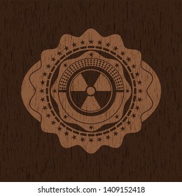 nuclear, radioactive icon inside wood emblem. Retro