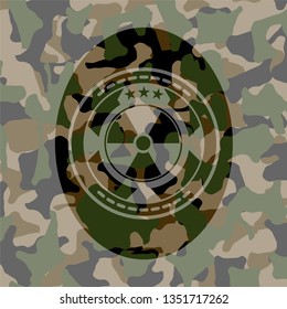 nuclear, radioactive icon on camouflaged pattern