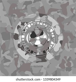 nuclear, radioactive icon on grey camouflage texture