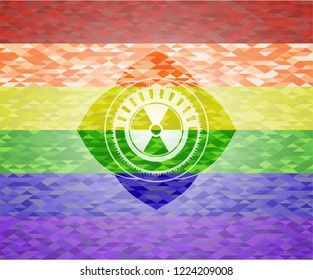 nuclear, radioactive icon on mosaic background with the colors of the LGBT flag