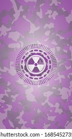 nuclear, radioactive icon on pink and purple camouflaged texture