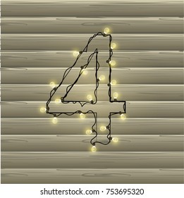 Number from the Christmas light garland on a beautiful wooden background