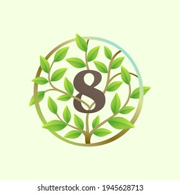 Number eight logo made of twisted tree branches and green leaves in circle. Ecology vector font for vegan emblem, botanical identity, creative spring t-shirts, organic merchandise.