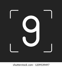 Number nine, numeral, simple letter. White object in camera autofocus on dark background