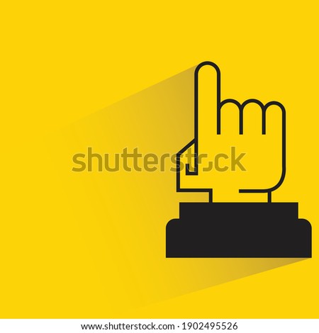 number one winner cup with shadow on yellow background
