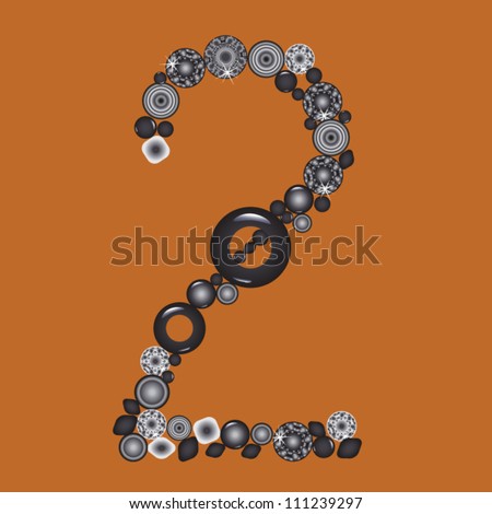 Number two from beads on brown background