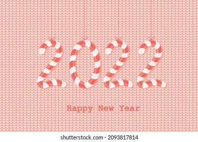 The numbers 2022 are in the form of sweet candies on a red knitted background. Happy New Year 2022! Candy cane in the form of numbers on strings. Christmas greeting card. Vector illustration