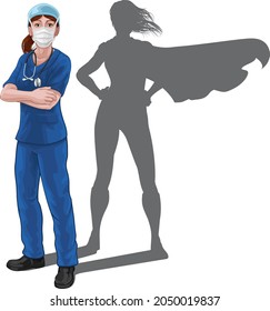 A nurse or doctor super hero woman in surgical or hospital scrubs with stethoscope and mask PPE. With arms folded and serious but caring look. Revealed as a superhero by the shape of her shadow.